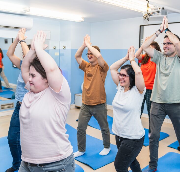 Active Yoga Stretch in Class With Down Syndrome Students