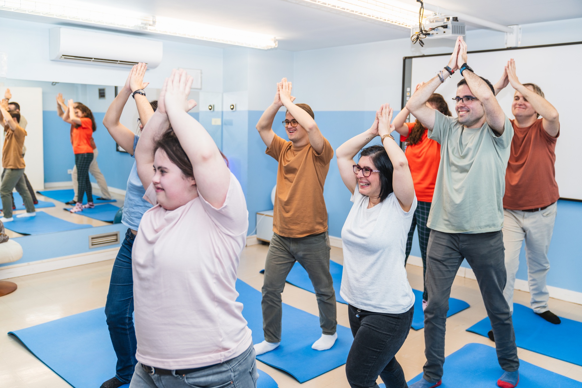 Active Yoga Stretch in Class With Down Syndrome Students