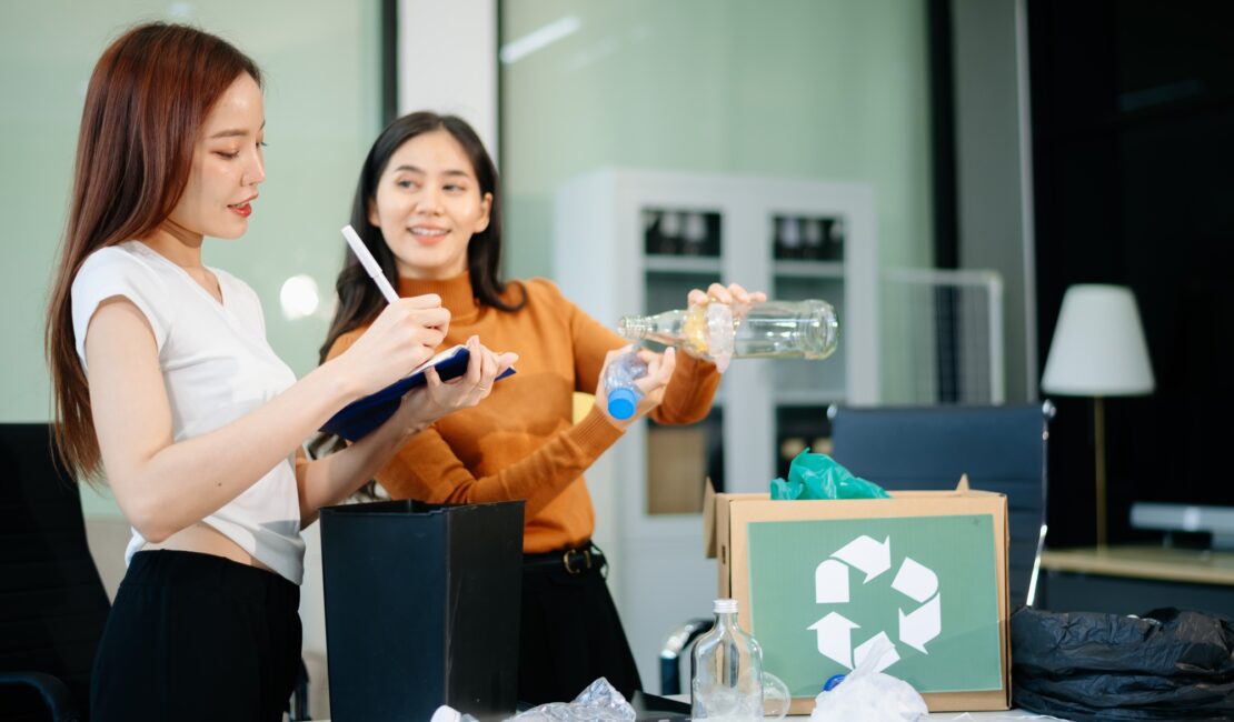 Eco friendly teamwork with this office recycling scene. Perfect for showcasing sustainability,