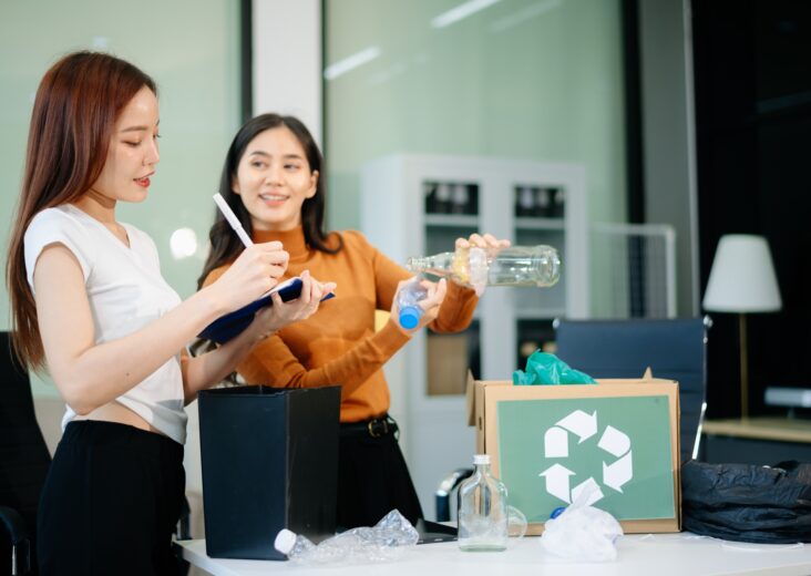 Eco friendly teamwork with this office recycling scene. Perfect for showcasing sustainability,