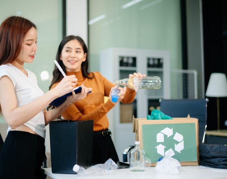 Eco friendly teamwork with this office recycling scene. Perfect for showcasing sustainability,