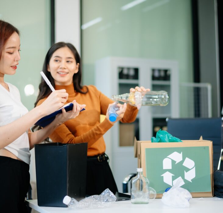 Eco friendly teamwork with this office recycling scene. Perfect for showcasing sustainability,