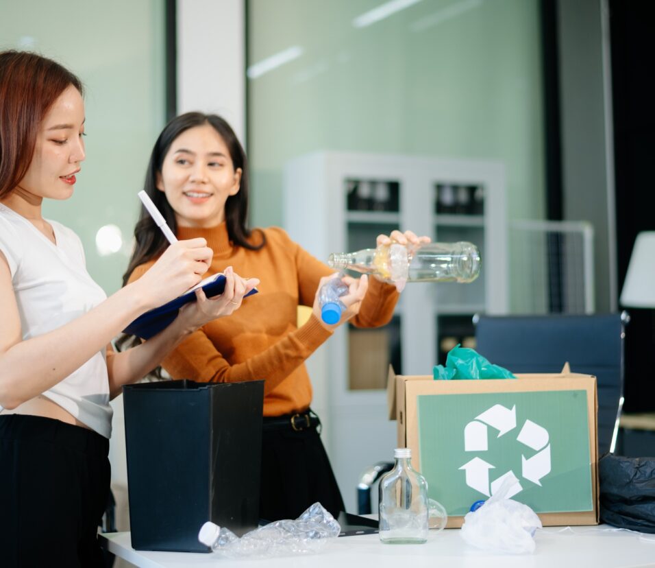 Eco friendly teamwork with this office recycling scene. Perfect for showcasing sustainability,