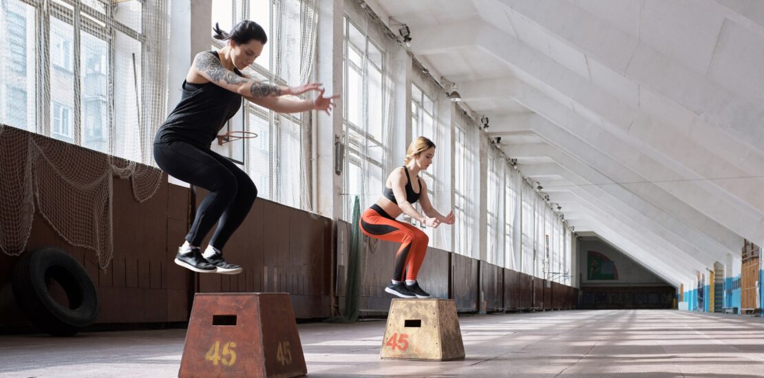 Girls having full-body training