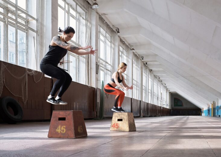 Girls having full-body training