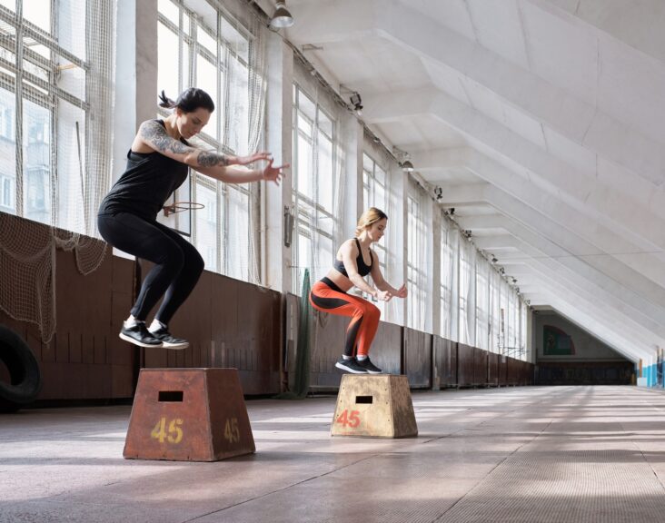 Girls having full-body training