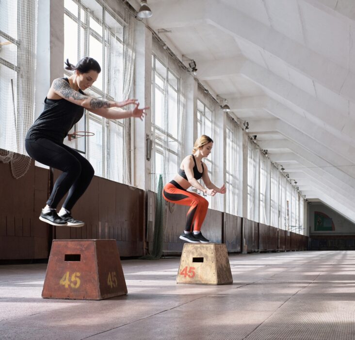 Girls having full-body training