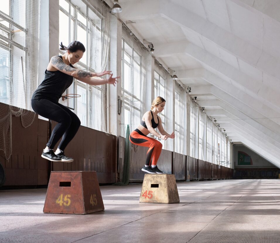 Girls having full-body training
