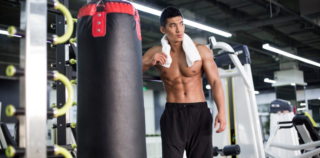 Young man resting at gym