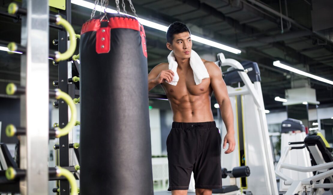 Young man resting at gym