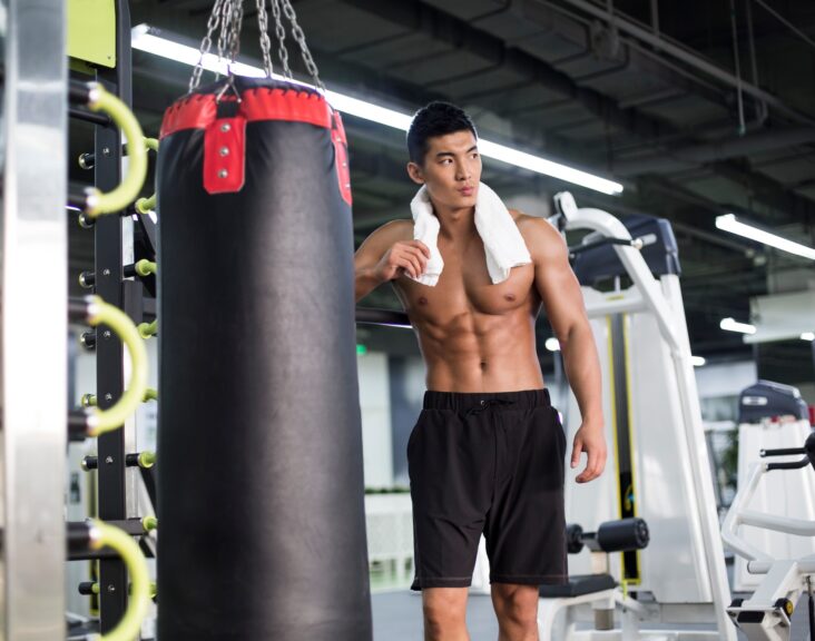 Young man resting at gym
